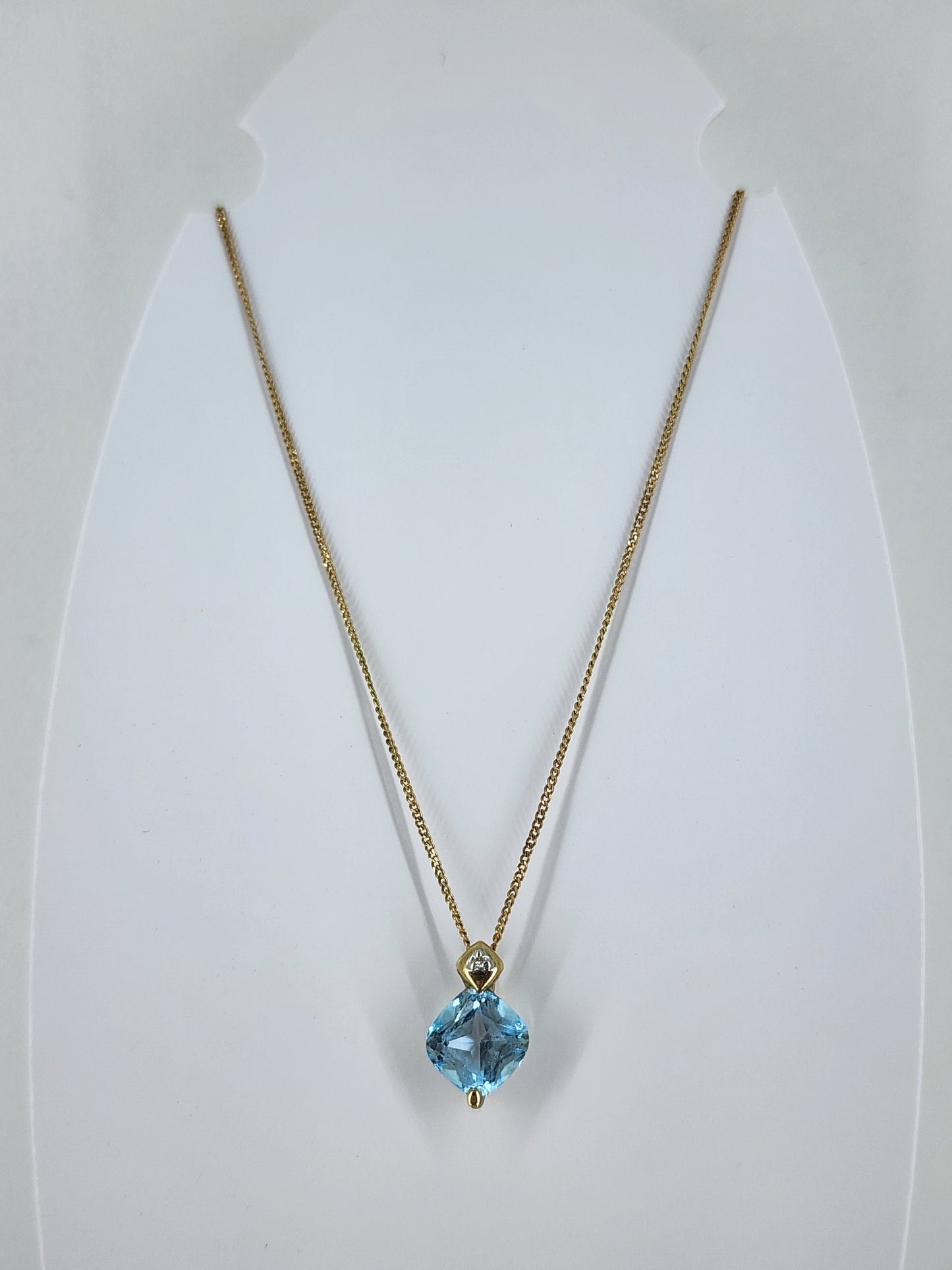 10K yellow gold diamond and blue topaz necklace 8510