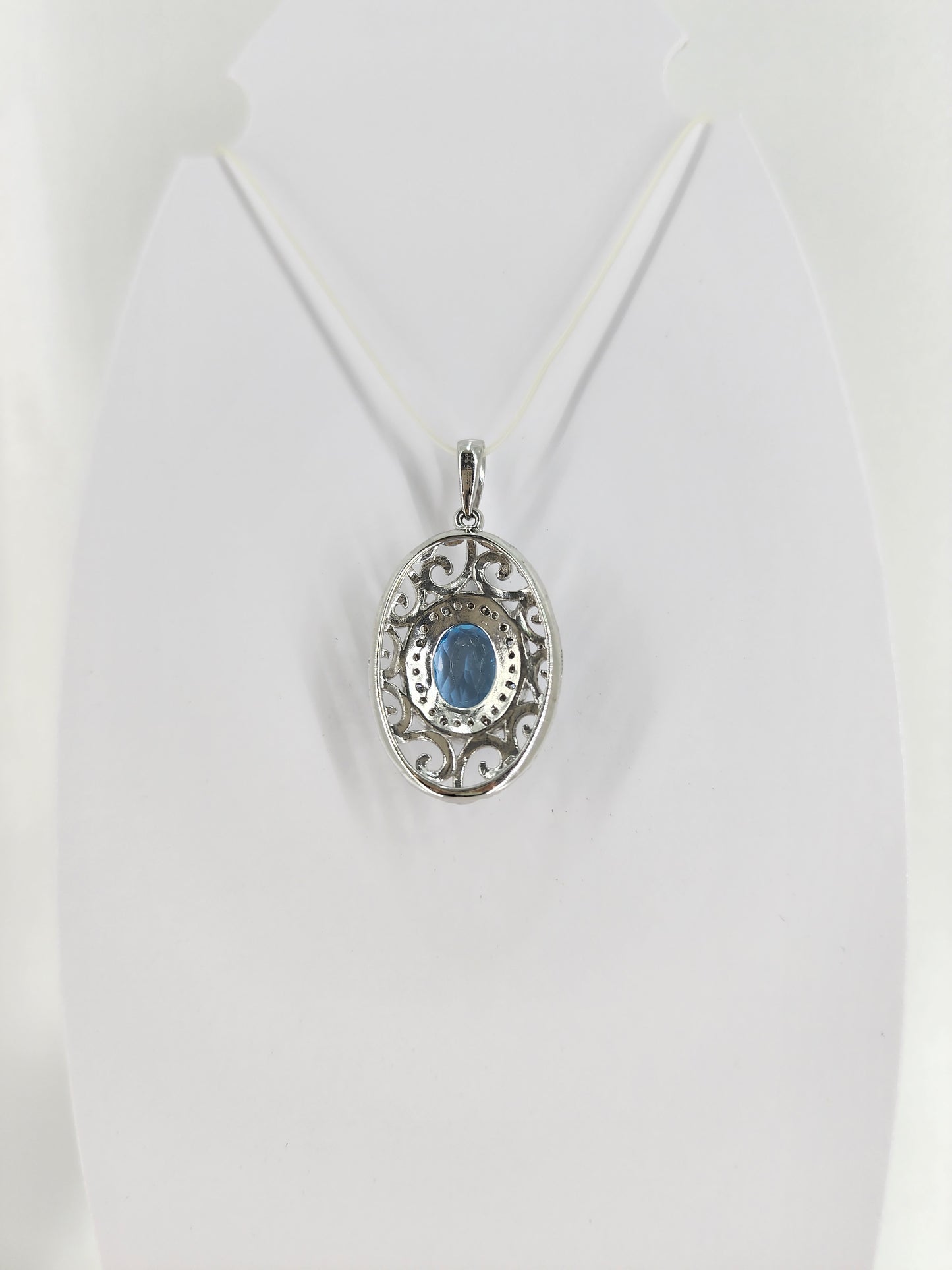 10K white gold blue topaz and diamond pendant  18332